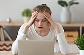 slow broadband frustrated woman
