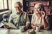 older couple using internet at home