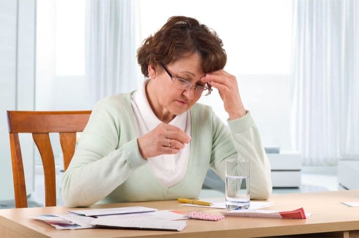 older woman money worries