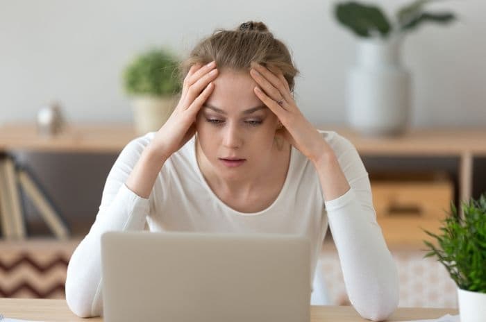 slow broadband frustrated woman