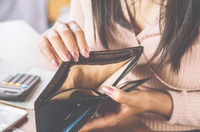 woman with empty wallet