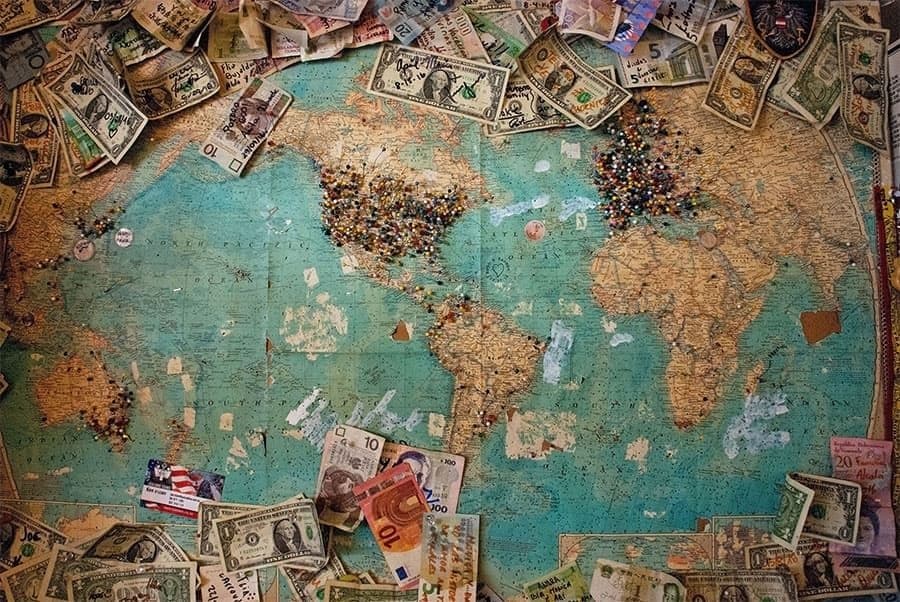 map of the world and money